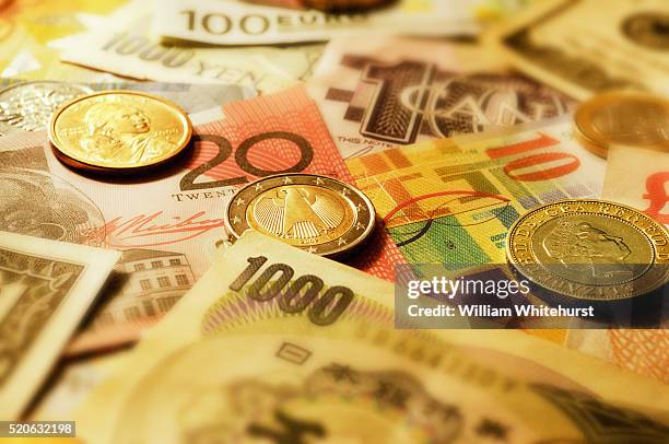 various world currencies - swiss money stockfoto's en -beelden