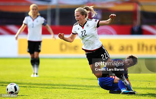 Tabea Kemme of Germany is challenged by Violeta Baban of Croatia during the UEFA Women's Euro 2017 qualifier between Germany and Croatia at Osnatel...