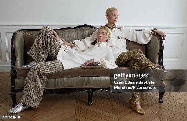 Actress Tilda Swinton is photographed for Madame Figaro on February 6, 2016 in Paris, France. Left: Blouse, pantalon and mocassins . Right: Blouse,...