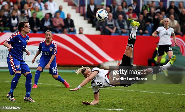 Alexndra Popp of Germany shoots on goal during the UEFA Women's Euro 2017 qualifier between Germany and Croatia at Osnatel Arena on April 12, 2016 in...