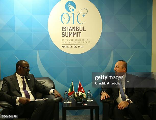 Turkish Foreign Minister Mevlut Cavusoglu attends a meeting with Foreign Minister of Mali Abdoulaye Diop within the OIC foreign ministers' meeting in...