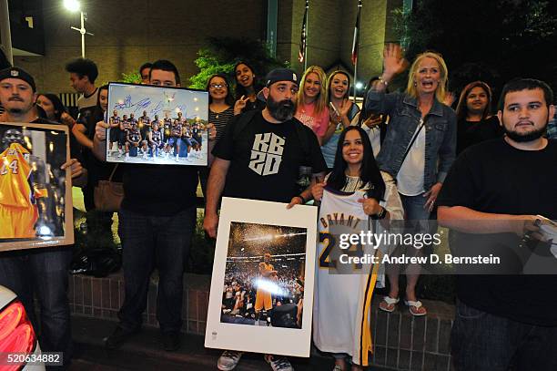 Fans of Kobe Bryant of the Los Angeles Lakers wait as the Laker plane and arrives in Houston, Texas from New Orleans, Louisiana on April 8, 2016....