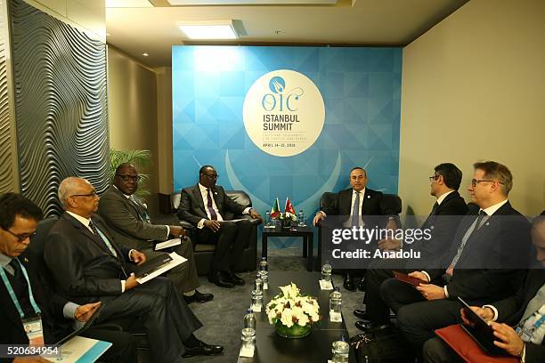 Turkish Foreign Minister Mevlut Cavusoglu attends a meeting with Foreign Minister of Mali Abdoulaye Diop within the OIC foreign ministers' meeting in...