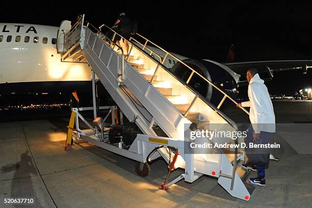 Kobe Bryant of the Los Angeles Lakers boards the plane to travel back to Los Angeles, California from Oklahoma City, Oklahoma on April 11, 2016. NOTE...