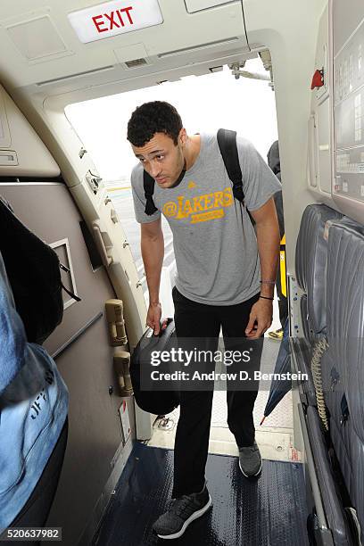 Larry Nance Jr. #7 of the Los Angeles Lakers boards the plane in route to New Orleans, Louisiana from Inglewood, California on April 7, 2016. NOTE TO...