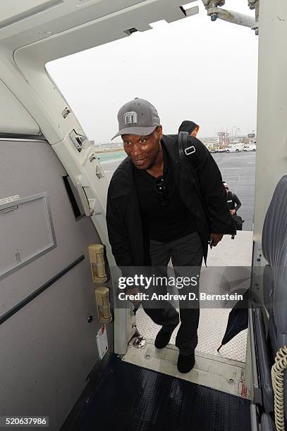 Byron Scott of the Los Angeles Lakers boards the plane to travel to New Orleans, Louisiana from Inglewood, California on April 7, 2016. NOTE TO USER:...
