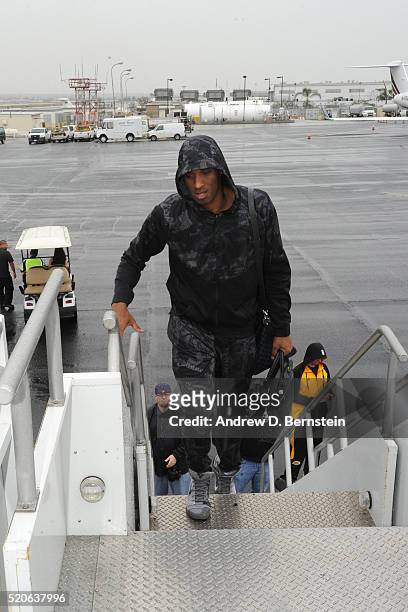 Kobe Bryant of the Los Angeles Lakers boards the plane to travel to New Orleans, Louisiana from Inglewood, California on April 7, 2016. NOTE TO USER:...