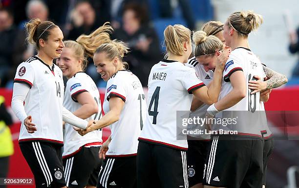 Anja Mittag of Germany celebrates with team mates after scoring her teams second goal during the UEFA Women's Euro 2017 qualifier between Germany and...