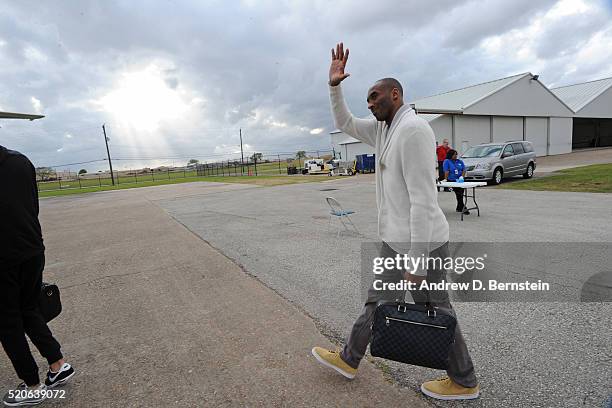 Kobe Bryant of the Los Angeles Lakers walks to the plane to travel to Oklahoma City, Oklahoma from Houston, Texas on April 10, 2016. NOTE TO USER:...