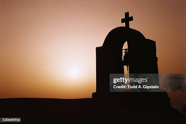 silhouette of a bell tower and cross - igreja ortodoxa grega imagens e fotografias de stock