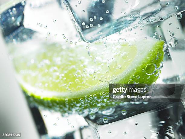 lime in iced drink - cold drink stock pictures, royalty-free photos & images