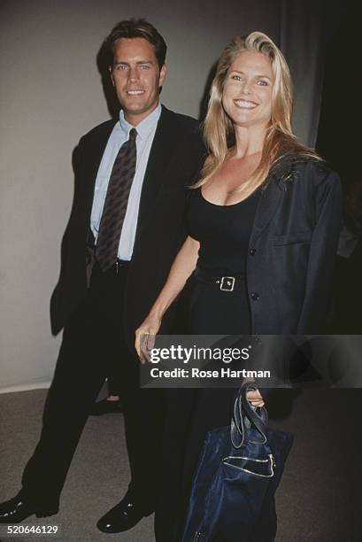 American model and actress Christie Brinkley with her husband, architect Peter Cook at the Giorgio Armani party at The Armory, New York City, USA,...
