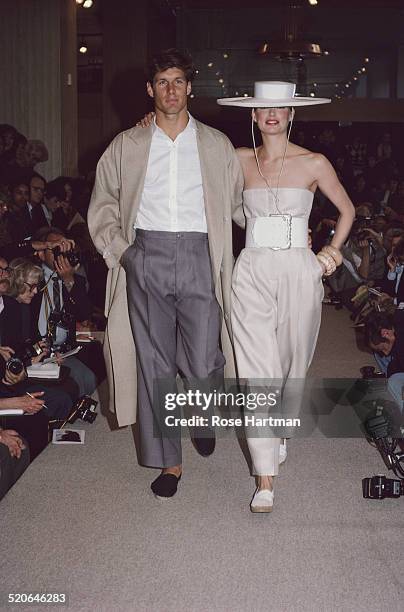 Models wearing designs from Perry Ellis on the catwalk in the designers studio, October 1982.