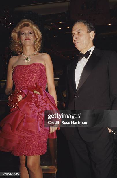 American heir, business magnate and philanthropist Samuel Irving Newhouse, Jr. And Czech-American socialite and fashion model Ivana Trump at a party...