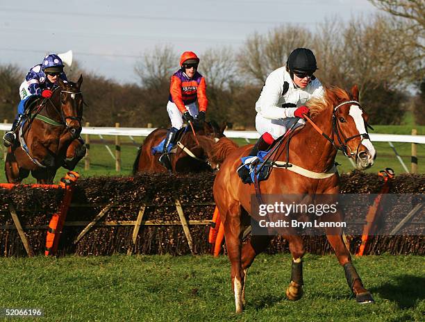 Robert Thornton riding Penzance breaks clear at the last hurdle during the Class E Div II Novices' Handicap Hurdle race at Huntingdon Race Course on...