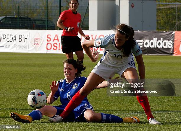 Jill Scott of England is challenged by Marija Aleksic of Bosnia during the UEFA Women's European Championship Qualifier match between Bosnia and...