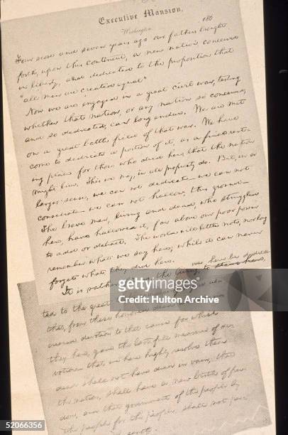 View of two pages of a reproduction of a early draft of American President Abraham Lincoln's Gettysburg address, which was delivered, after several...