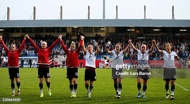 Players of Germany celebrate after winning the UEFA Women's Euro 2017 qualifier between Germany and Croatia at Osnatel Arena on April 12, 2016 in...