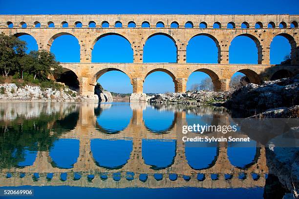 pont du gard and gard river - pont du gard ストックフォトと画像