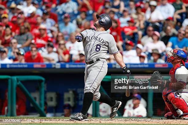 Michael McKenry of the Colorado Rockies looks on after hitting a solo home run in the second inning of the game against the Philadelphia Phillies at...