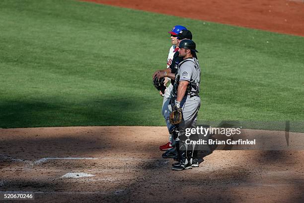 Michael McKenry of the Colorado Rockies looks on during the seventh inning stretch during the game against the Philadelphia Phillies at Citizens Bank...