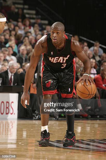 Dwyane Wade of the Miami Heat moves the ball during the game against the Portland Trail Blazers at the Rose Garden on January 7, 2005 in Portland,...