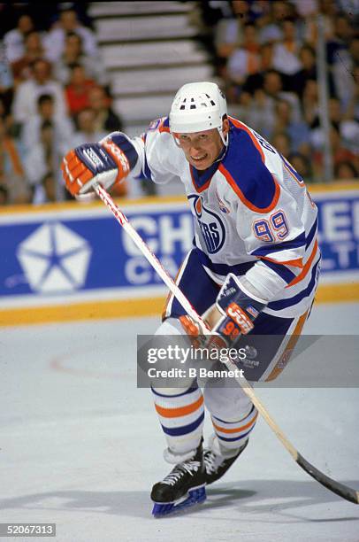 Canadian professional ice hockey player Wayne Gretzky forward of the Edmonton Oilers skates on the ice during a home game at Northlands Coliseum,...