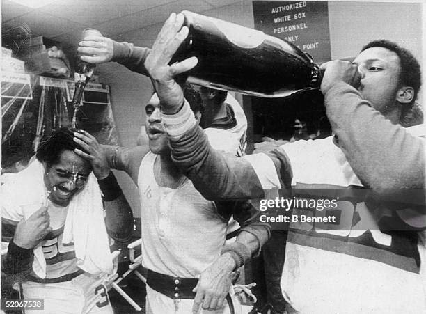 American professional baseball players outfielder Harold Baines, second baseman Julio Cruz, and outfielder Rudy Law of the Chicago White Sox...