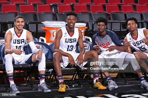 Jayson Tatum, Harry Giles, Josh Jackson and Marques Bolden of the USA Junior Select Team smile for a photo before the game against the World Select...