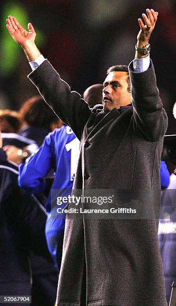 Coach Jose Mourhino of Chelsea celebrates victory after the Carling Cup Semi Final Second Leg match between Manchester United and Chelsea at Old...