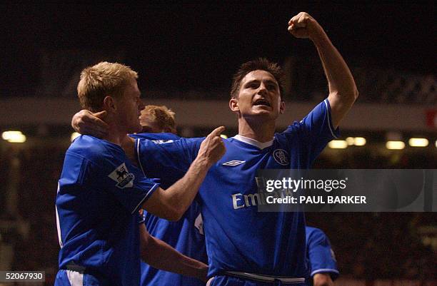 Chelsea's Damien Duff celebrates with team mate Frank Lampard after scoring to make it 2-1 against Manchester United during their Carling Cup...