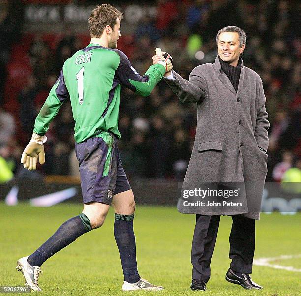 Jose Mourinho of Chelsea congratulates Petr Cech at the end of the Carling Cup semi-final second leg between Manchester United and Chelsea at Old...