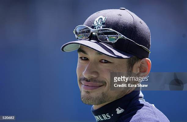 Right fielder Ichiro Suzuki of the Seattle Mariners smiles before the MLB game against the New York Yankees at Yankee Stadium in the Bronx, New York...