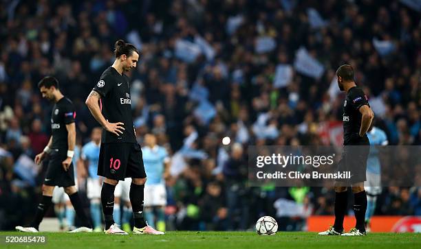 Zlatan Ibrahimovic and Lucas Moura of Paris Saint-Germain look dejected as Kevin de Bruyne of Manchester City scores their first goal during the UEFA...