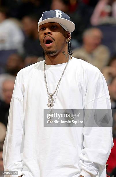 Allen Iverson of the Philadelpia 76ers watches from the bench during the game against the Washington Wizards on January 26, 2005 at the MCI Center in...