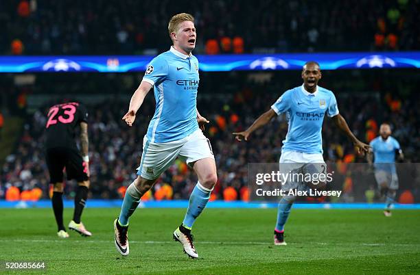 Kevin de Bruyne of Manchester City celebrates with Fernandinho as he scores their first goal during the UEFA Champions League quarter final second...