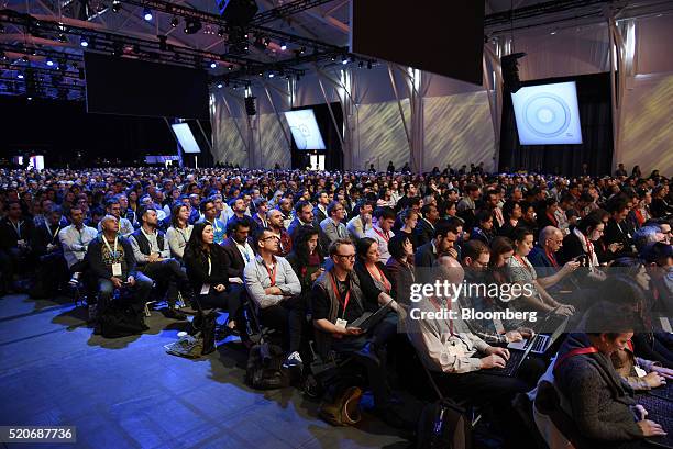 Attendees listen to keynote presentations during the Facebook F8 Developers Conference in San Francisco, California, U.S., on Tuesday, April 12,...