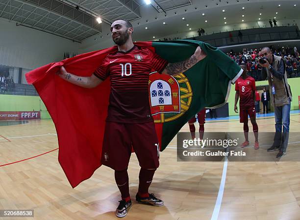 Portugal's forward Ricardinho celebrate the victory at the end of the FIFA Futsal playoff match between Portugal and Serbia at Pavilhao Multiusos de...