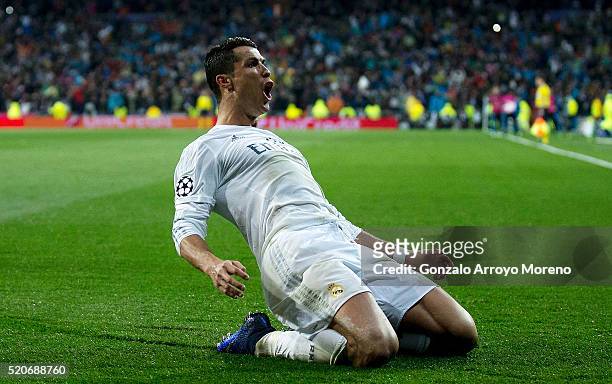 Cristiano Ronaldo of Real Madrid celebrates as he scores their third goal from a free kick and completes his hat trick during the UEFA Champions...