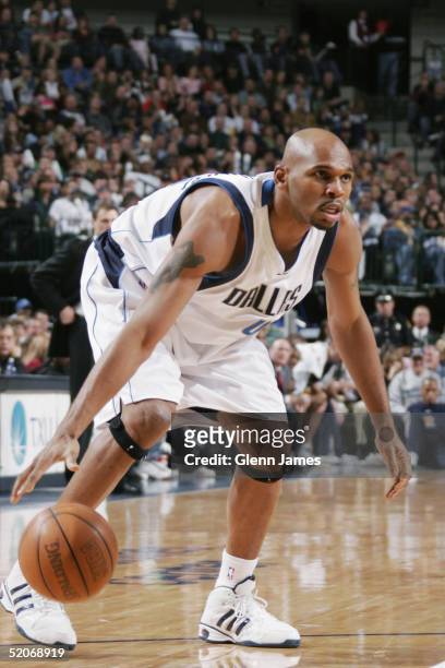 Jerry Stackhouse of the Dallas Mavericks moves the ball during the game against the Indiana Pacers at American Airlines Arena on January 8, 2005 in...