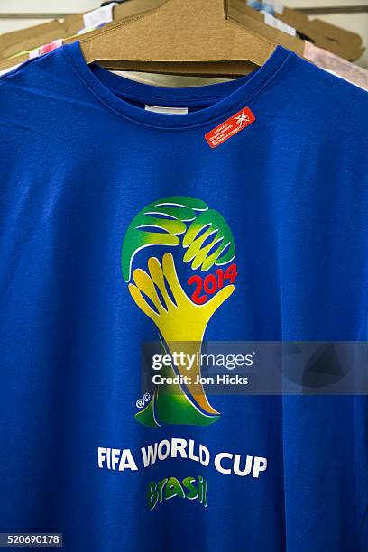 world cup 2014 merchandise for sale in rio de janeiro. - rio mascot stock pictures, royalty-free photos & images