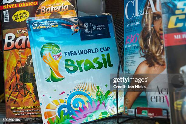 world cup sticker book. - rio mascot stock pictures, royalty-free photos & images