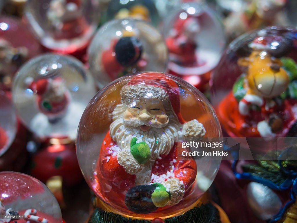 Snow globes for sale in Colmar Christmas Market, France.