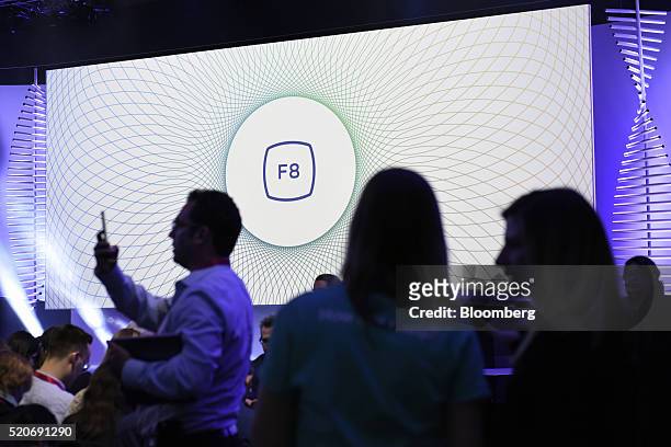 Attendees wait for the start of a keynote presentation during the Facebook F8 Developers Conference in San Francisco, California, U.S., on Tuesday,...