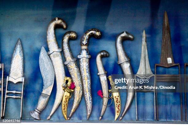 war weapons in museum of udaipur rajasthan - kukris stock pictures, royalty-free photos & images