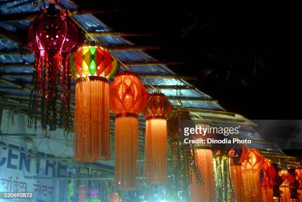 row of illuminated lanterns for sale mumbai maharashtra india asia - diwali lights stock-fotos und bilder