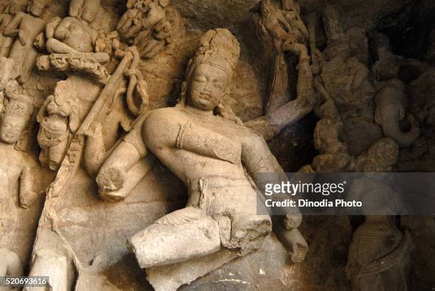 sculpture of lord shiva performing tandava elephanta caves gharapuri mumbai india asia - elephanta caves stock pictures, royalty-free photos & images
