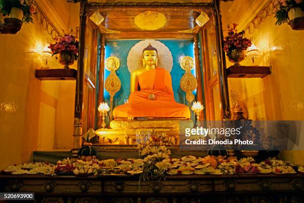 statue of gautam buddha, unesco world heritage mahabodhi temple, bodhgaya, bihar, india - world heritage mahabodhi stock pictures, royalty-free photos & images