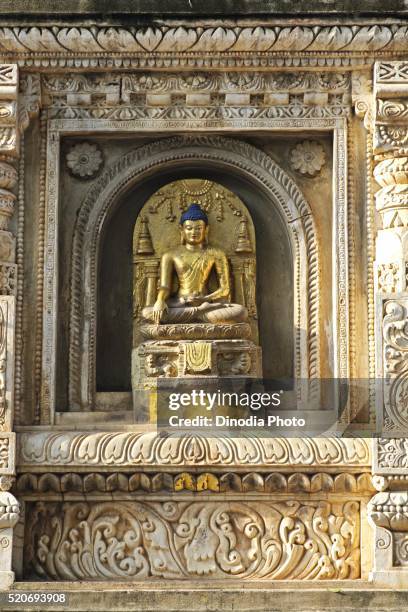 statue of gautam buddha, unesco world heritage mahabodhi temple, bodhgaya, bihar, india - world heritage mahabodhi stock pictures, royalty-free photos & images