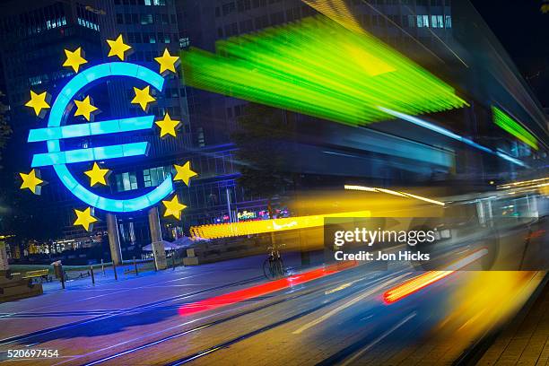 the euro sculpture at the european central bank. - germany economy stock pictures, royalty-free photos & images